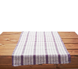 Wall Mural - Tablecloth or towel over the wooden table