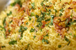 Yellow rice with fried onion and parsley.