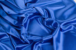 Blue silk heart background. Close up.