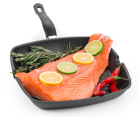 Wall Mural - Fresh salmon fillet on a pan.