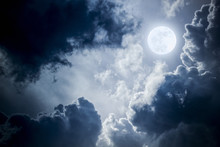 Dramatic Nighttime Clouds And Sky With Beautiful Full Blue Moon