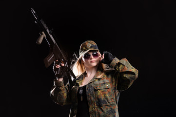 Beautiful army girl with gun