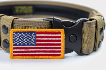 Rounded American flag patch and tactical belt.