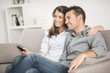 © Atelier 211 - Young couple watcing tv