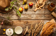 Natural local food products on vintage wooden table - rustic composition captured from above. Country lifestyle, rural vacation or agritourism concept. Background layout with free text space.