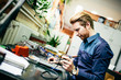 © BGStock72 - Young man in electronics workshop