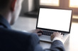 © guteksk7 - Businessman working on the laptop with blank screen