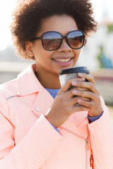 Sticker - smiling african american woman drinking coffee