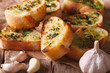 Toast with fresh herbs and garlic closeup. horizontal
