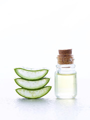 fresh aloe vera with aroma oil on moisture background