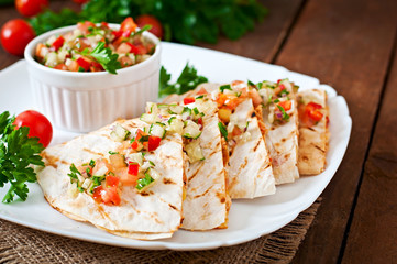 Mexican Quesadilla wrap with chicken, corn and salsa