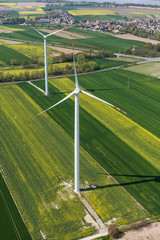 aerial view of wind turbine on a field