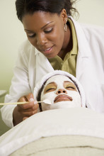 African Woman Receiving Spa Facial Treatment