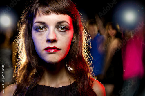 Fotografering Disheveled drunk or female high on drugs at a nightclub