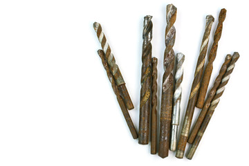 Wall Mural - Used Steel drill bits - Different shapes on white background