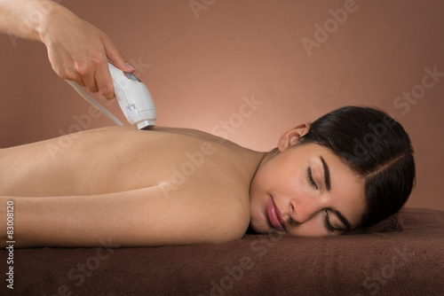 Woman Receiving Epilation Laser Treatment Fototapet