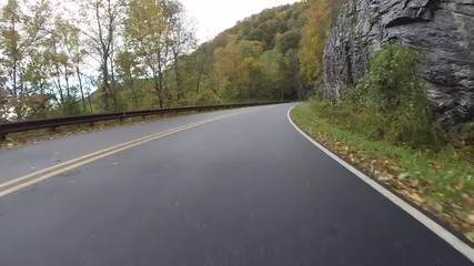 Wall Mural - Climbing uphill on the Blue Ridge Parkway along a rock face