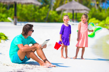 Little upset sad girls waiting father to swim while he working