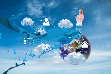 Poster - Composite image of smiling blonde sending a text message 