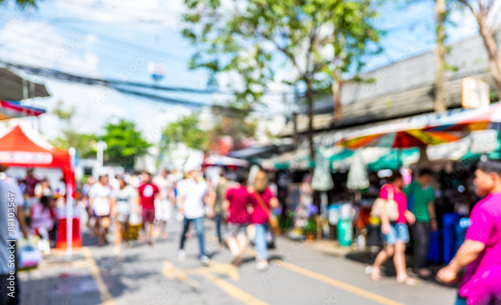 Blurred background : people shopping at market fair in sunny day - obrazy, fototapety, plakaty 