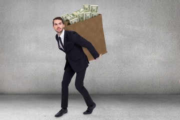 Poster - Composite image of businessman carrying something with his hands