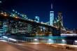 Brooklyn Bridge, Downtown Manhattan, New York. Night scene. Light trails. City lights. Urban living and transportation concept
