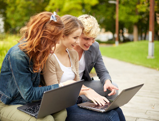 Sticker - students or teenagers with laptop computers