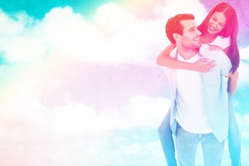 Poster - Happy casual man giving pretty girlfriend piggy back