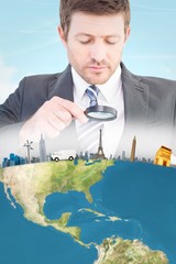 Poster - Businessman looking at tablet with magnifying glass