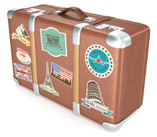 Vintage Suitcase. Leather Suitcase With Retro Travel Stickers.