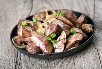 Wall Mural - Cooked chicken liver in frying pan