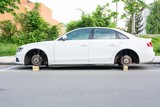 Fototapeta  - Car with stolen wheels