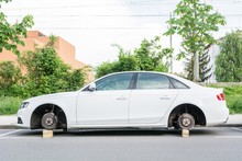 Car with stolen wheels