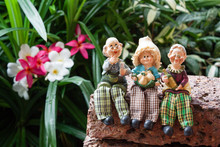 Lovely Grandparents With Child Ceramic Dolls