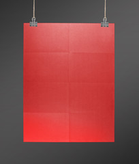 Red poster on a rope.