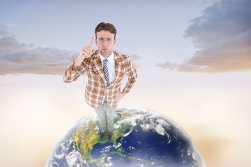 Poster - Composite image of upset geeky hipster pointing at camera