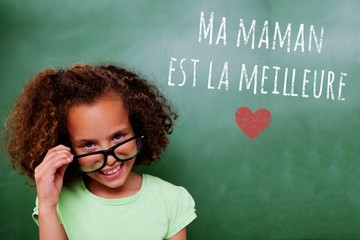 Poster - Composite image of cute pupil tilting glasses