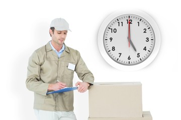 Poster - Composite image of delivery man writing on clipboard