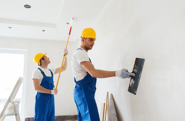 Wall Mural - group of builders with tools indoors