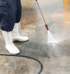 Outdoor floor cleaning with high pressure water jet