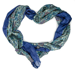 Blue women's silk scarf on a white hanger in the form of heart.