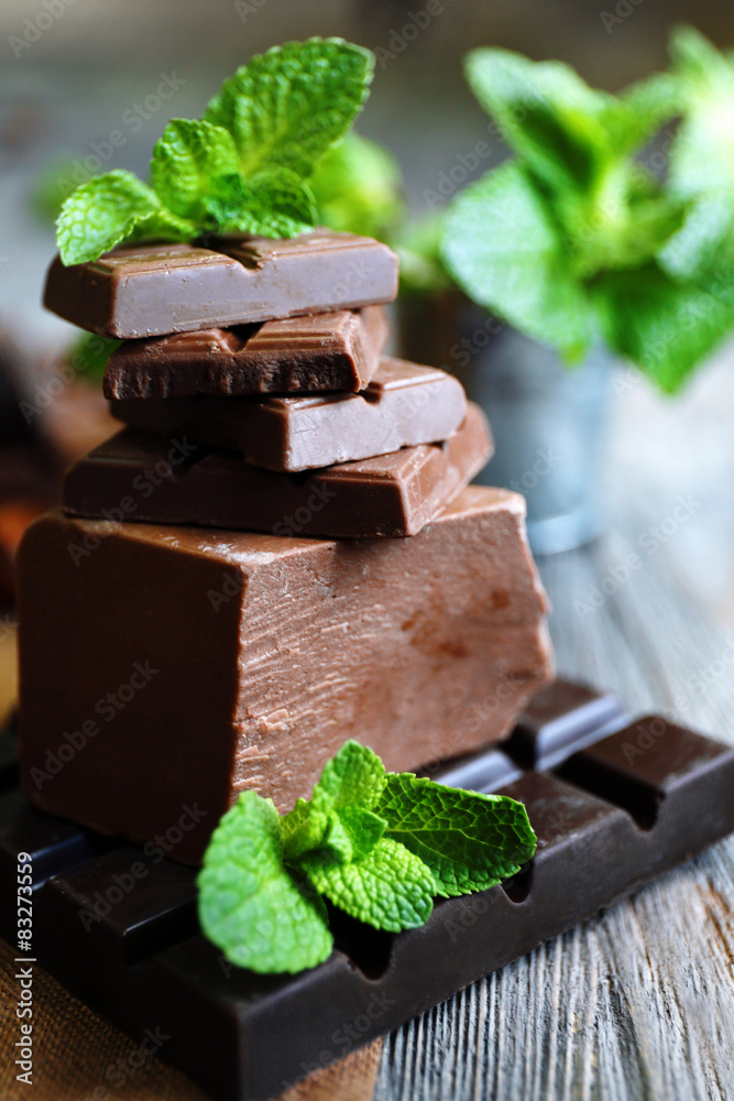 Set of spicy chocolate on wooden table, closeup