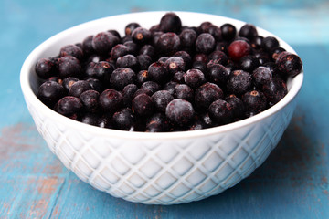 Canvas Print - Blackberry in bowl on wooden background