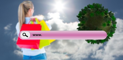Poster - Composite image of pretty blonde holding shopping bags