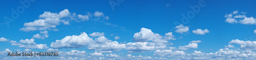 Fototapeta na wymiar White heap clouds in the blue sky.