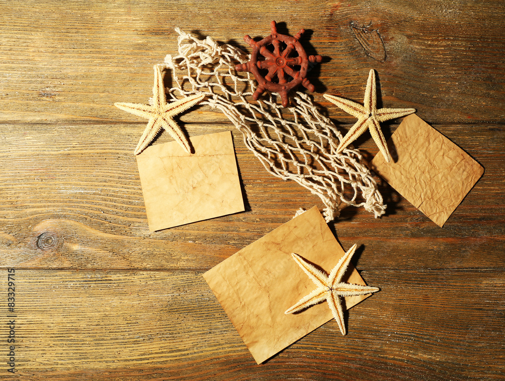 Card blanks with sea stars on wooden background