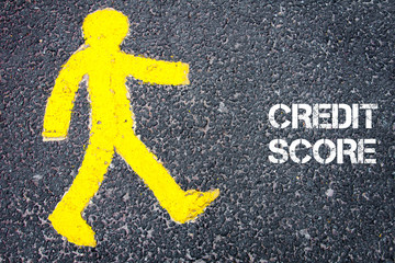 Yellow pedestrian figure walking towards CREDIT SCORE