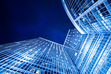 low angle view of illuminated modern building exterior