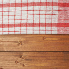 Wall Mural - Tablecloth or towel over the wooden table