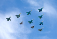 Russian Military Aircraft Fighters In Flight In Blue Sky